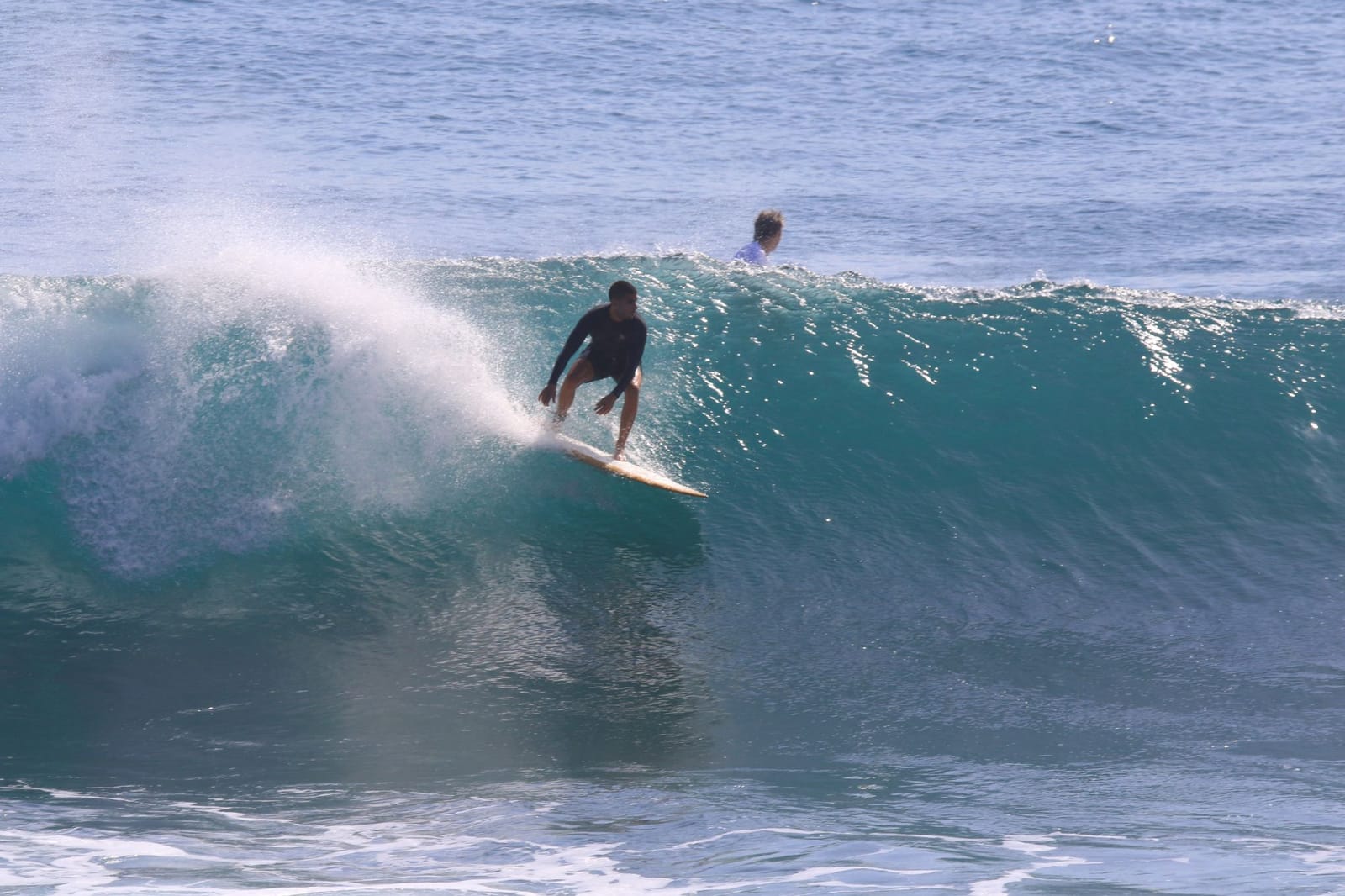 Simon turning off the top of a big reef wave